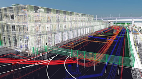 A translucent 3D building information modeling (BIM) scene and underground red and blue pipes running down the street