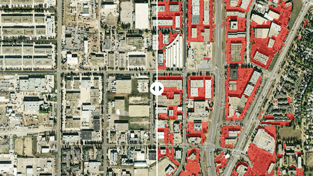 Satellite image showing a cluster of buildings with some outlined in red
