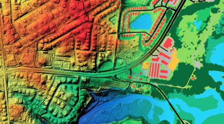 Digitale Luftbilddaten in Grün, Gelb und Orange, die eine umfangreiche Bilddatenanalyse darstellen