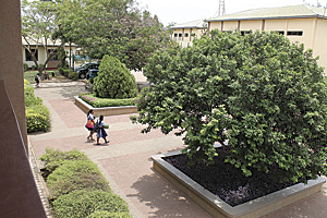 Students stroll across the SOS-Hermann Gmeiner International College in Tema.