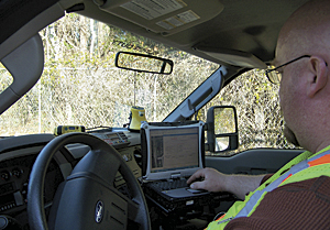 photo of technician working in the field