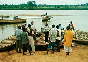 photo of Nigerian men on a riverbank