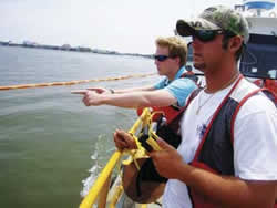 photo of crews on a boat gathering data