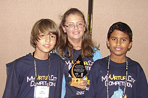In the primary school category, Max McField, Chloe Kelly, and Ethan Singh from Belize Elementary School took first place for their city called Nebulous.
