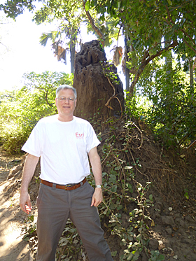 Gregg Gohrband wore his Esri t-shirt in front of a nine foot tall termite mound