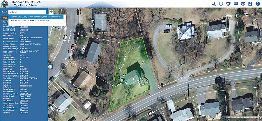 TaxView shows property information for an address including total market value, sale date, trash pickup day, and nearby schools.