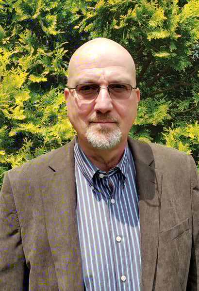 A headshot of Marzio Dellagnello