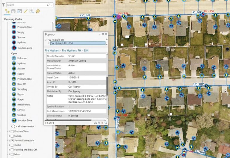 Aerial imagery of a residential area with lines and points that mark water resources, plus a pop-up with information about a particular fire hydrant