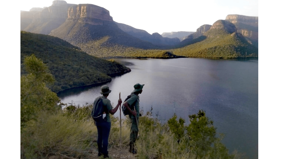 water assessors above a reservoir looking down