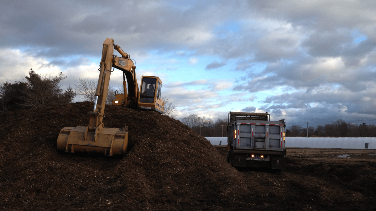 excavator loading truck