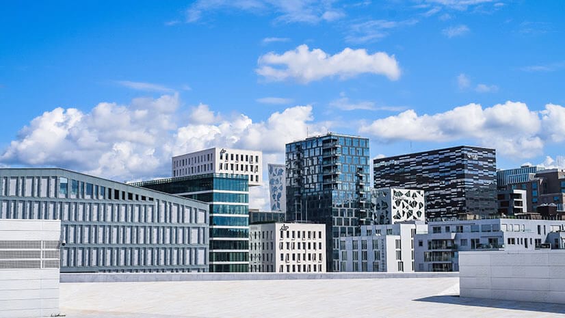 Climate risk symbolized by a cluster of modern office buildings