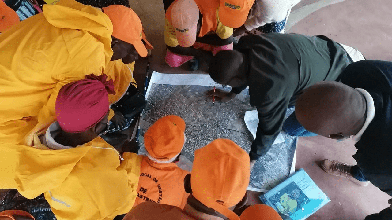 drone team looking at an orthophoto