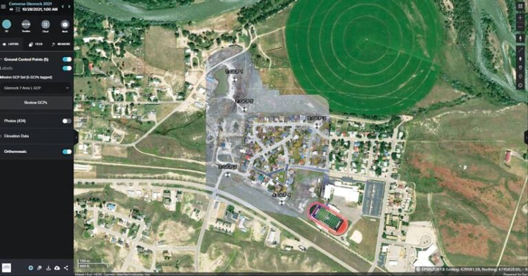 Aerial imagery of a town with ground control points on it and information about those points on the left side of the screen