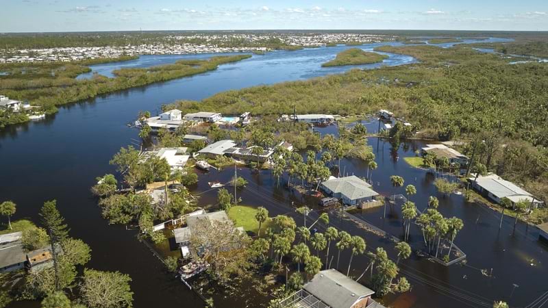teams in boats searched flooded homes