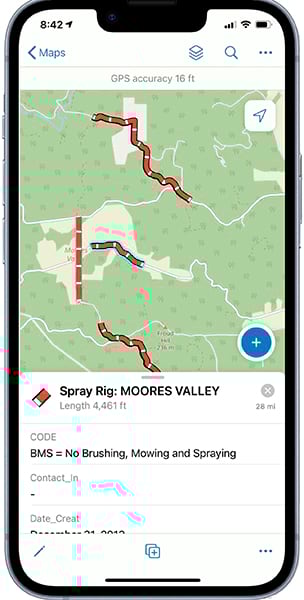 A mobile phone app shows a map with a mostly green background and four narrow red areas that are labeled “Spray Rig: Moores Valley.”