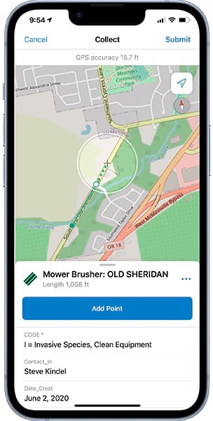 A mobile phone app map shows a recreation of roads, green space, and other features. A circle outline in the middle of the image contains a crosshair symbol, a small circle, and a dotted green line that extends to a thin, solid green line outside of the circle outline.