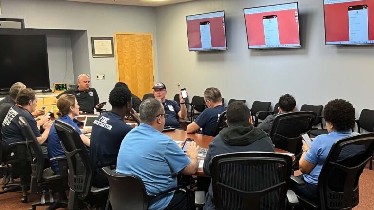 Fire inspection teams learning about a damage assessment app