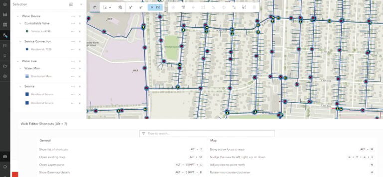 A map of water lines, services, valves, and connections with a list of ArcGIS Web Editor shortcuts shown underneath