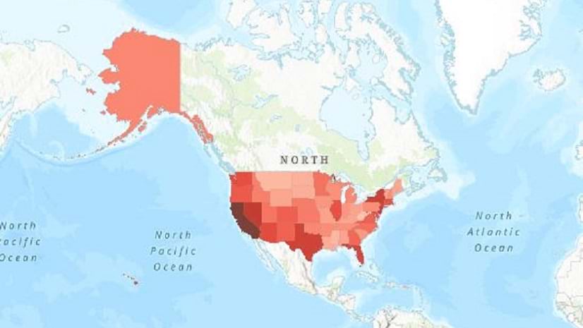 A centered on North America shows US states in varying shades of red