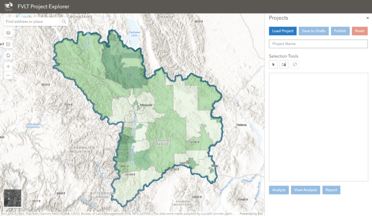 A map with a central outlined area with green areas of varying shades