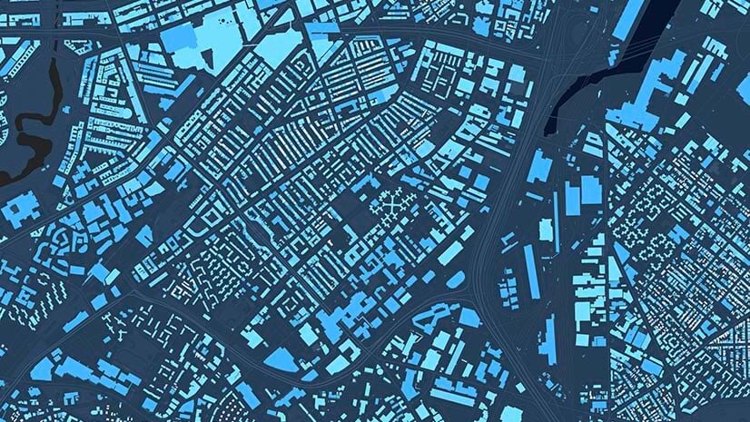 A dark blue city map with building footprints suggests location intelligence in unexpected places