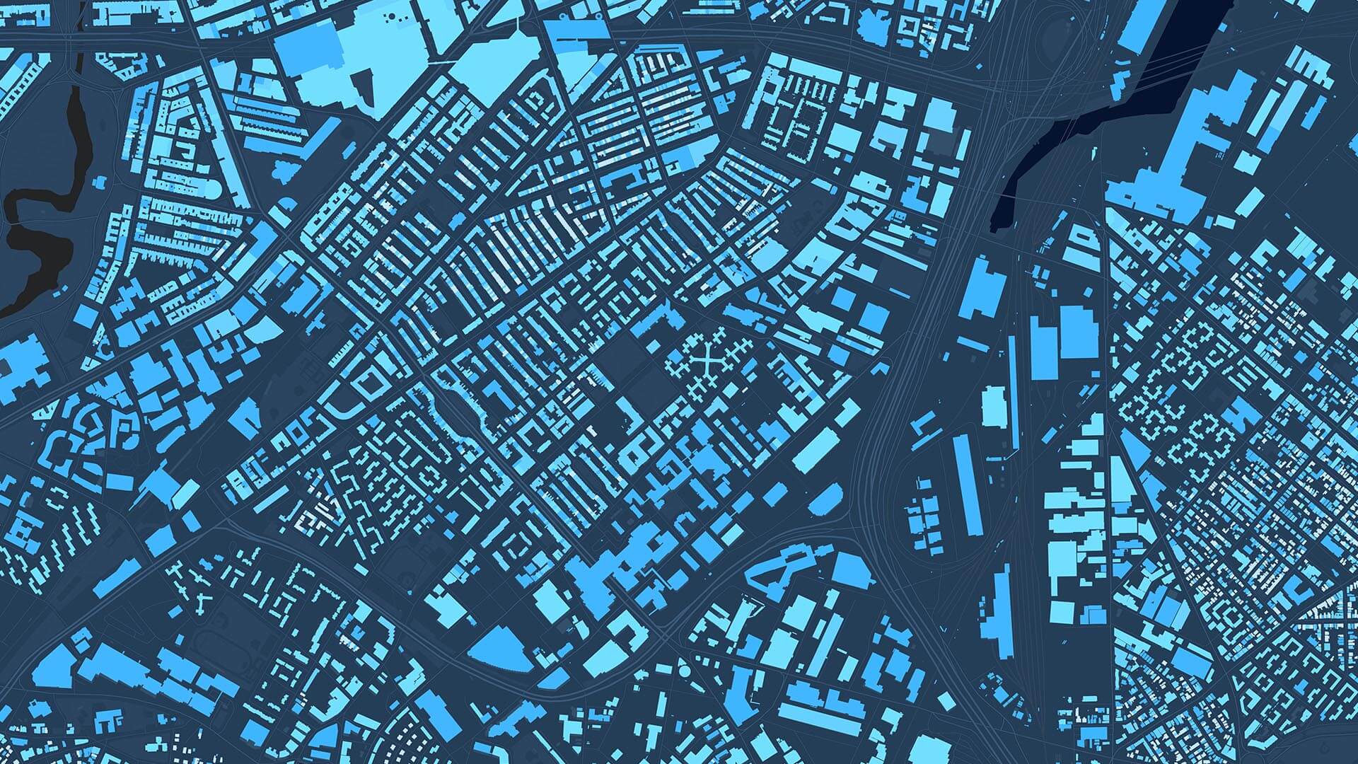 A blue city map with building footprints signifies a WhereNext webcast