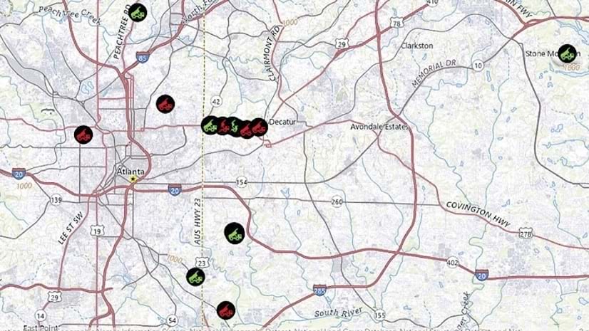 Map of Atlanta, Georgia, showing the locations where woodchips can be dropped off, marked by red and green wheelbarrow icons.