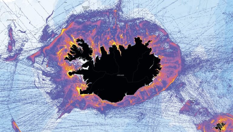 Heatmap visualizing fishing vessel traffic density around Iceland. The island of Iceland is shown in black, surrounded by a gradient of colors ranging from light purple to orange, indicating increasing levels of traffic. The surrounding ocean shows the paths of numerous vessels as thin purple lines.
