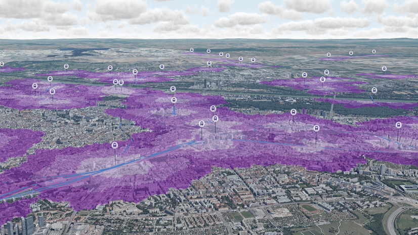Aerial image of a large urban city with large areas colored in purple and round icons with a car inside