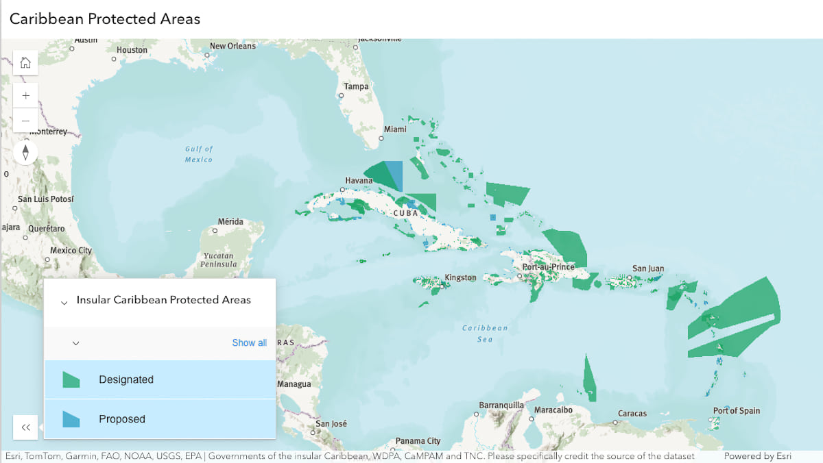 Interactive map titled "Caribbean Protected Areas" showing the Caribbean region with green shaded areas indicating designated protected zones and blue areas showing proposed protected areas across various islands and marine territories, with a legend panel on the left side distinguishing between designated and proposed protection status.