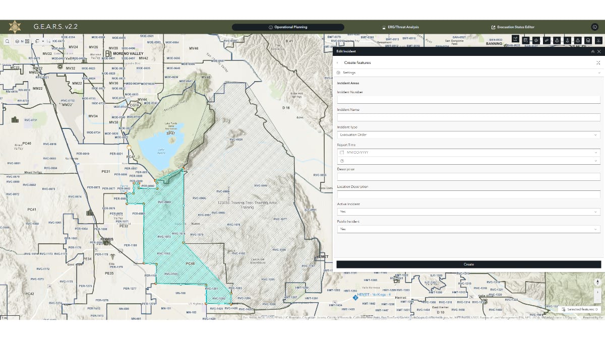 Screenshot of Riverside County's GEARS emergency platform showing a detailed map with fire perimeter boundaries highlighted in blue/teal, evacuation zones marked with diagonal lines, and a sidebar panel for creating incident features and managing evacuation data.