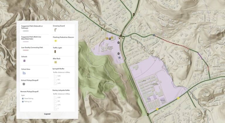 A map showing suggested sidewalk routes and multiuse pathways. The legend shows icons for suggested paths, school locations, crossing guards, pedestrian beacons, traffic lights and bike racks.