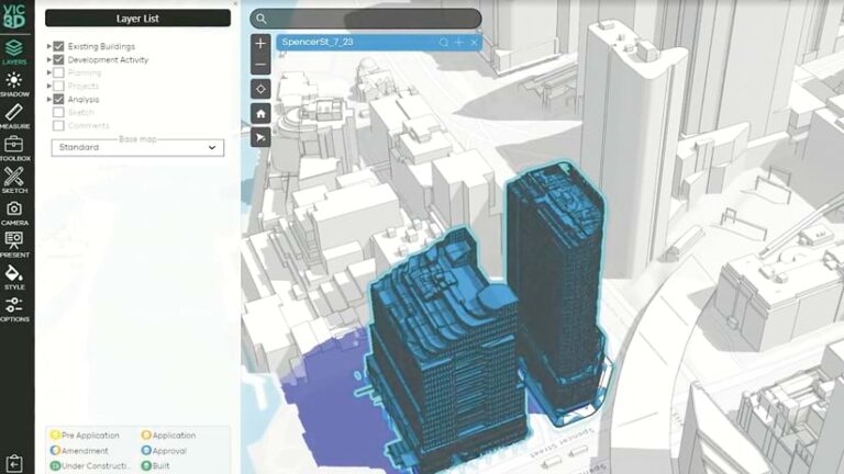 A 3D city model with development activity shown in blue. The Layer List is open, with options like "Existing Buildings" and "Analysis" selected. A search bar reads "SpencerSt_7_23." The map key shows the colors for pre-application, amendment, etc.
