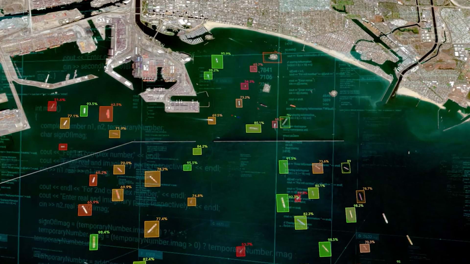 A satellite view of a bay with many ships highlighted in different colors