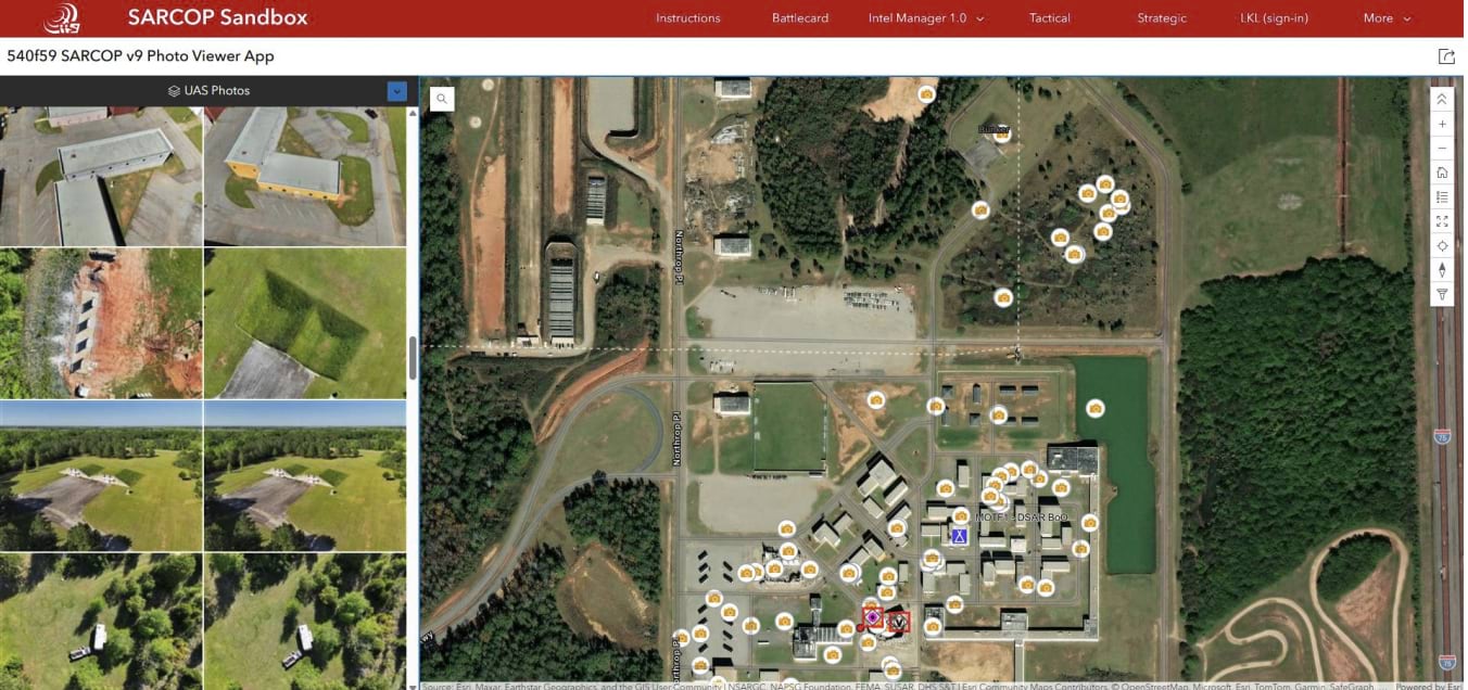 SARCOP photo viewer interface showing aerial map of Guardian Center with numerous camera icons marking drone photo locations, and thumbnail images on left panel displaying various aerial shots of training buildings and areas