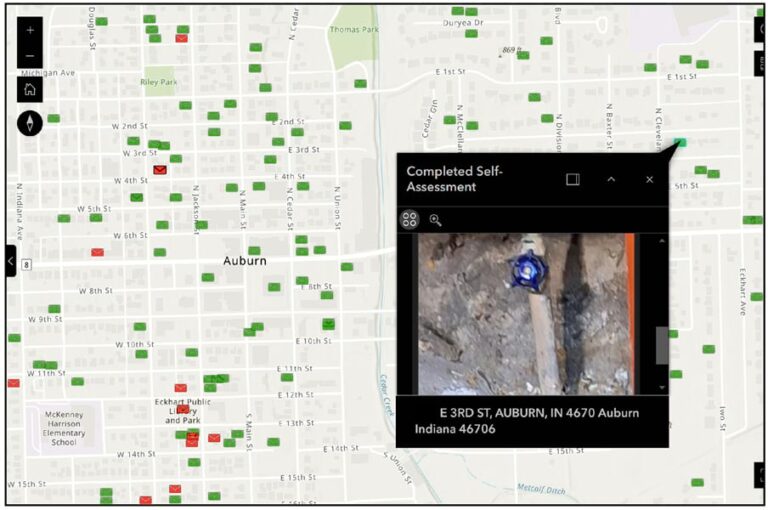 Screenshot of a map with many red and green boxes over various addresses, with more green than red, indicating the service lines that have been self-assessed.