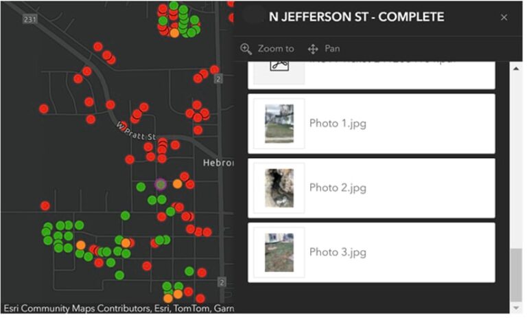 A black map covered in red, orange, and green dots, indicating locations where potholing has been completed.