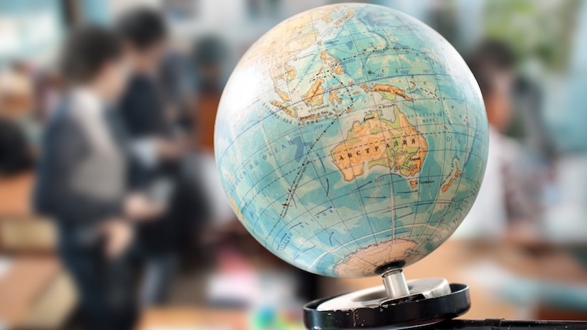 Closeup of a globe in a classroom