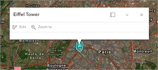 A white popup box with the words Eiffel Tower entered over a digital map of Paris