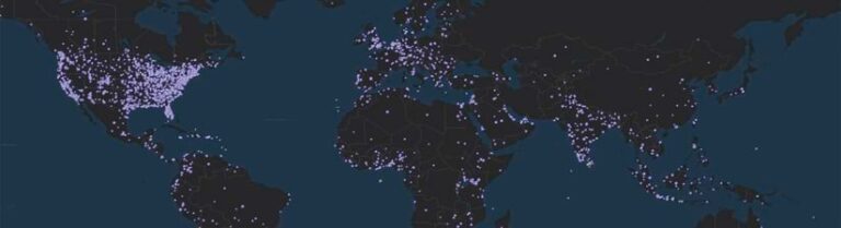 A dark basemap of the world, showing glowing lavender dots across the world, marking where YPN members live.