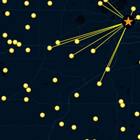 Yellow lines connecting dots on a black backdrop