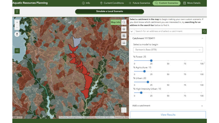 Screenshot of conservation mapping tool showing South Carolina watershed with red and gray areas indicating fish species probability under land use scenarios.