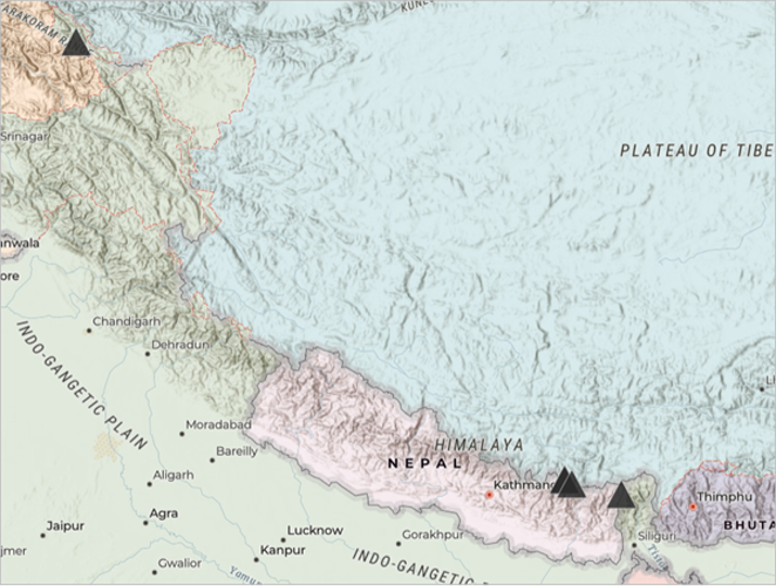 A map of a region of Asia with tall mountains marked by a black triangle