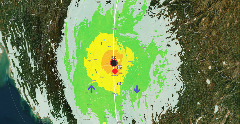 An earthquake intensity map on satellite imagery, showing a 7.7 magnitude epicenter with concentric color-coded intensity zones.