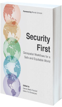 A white book cover with five overlapping globes of different colors on it that says Security First: Geospatial Workflows for a Safe and Equitable World