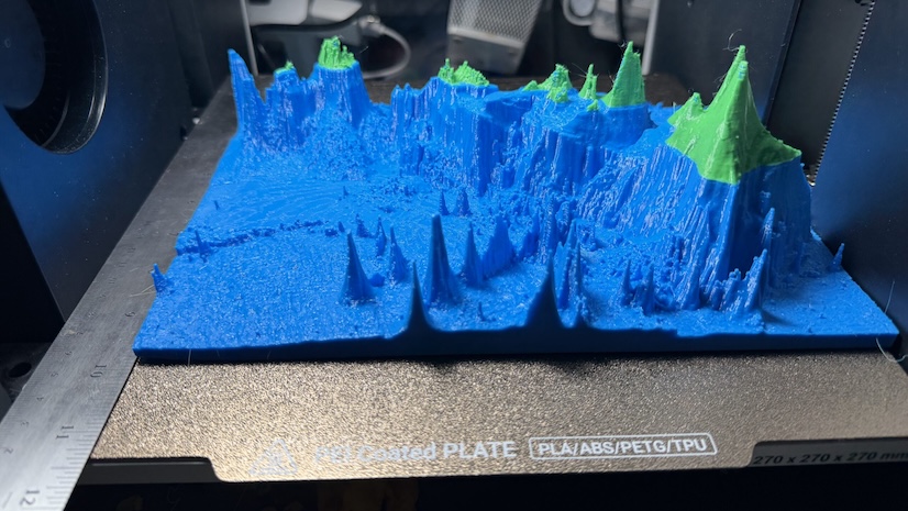 3D print of Crater Lake in green and blue
