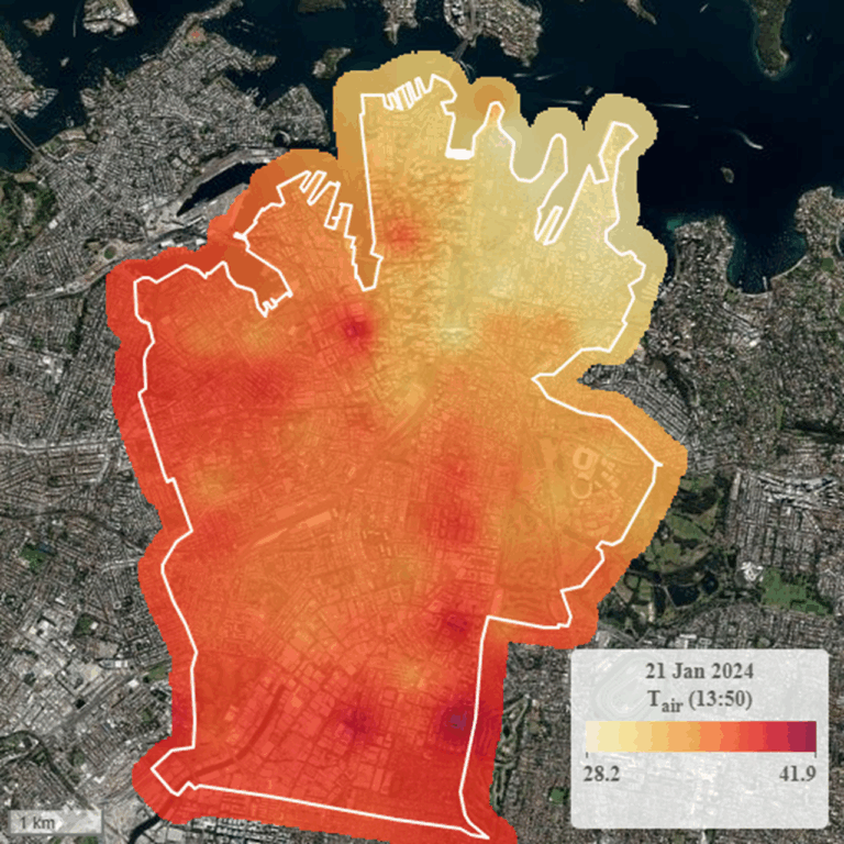 Map of a section of Sydney delineated by a white border and shaded red and yellow. The red section, which is farther inland, indicates areas of higher ambient temperature.