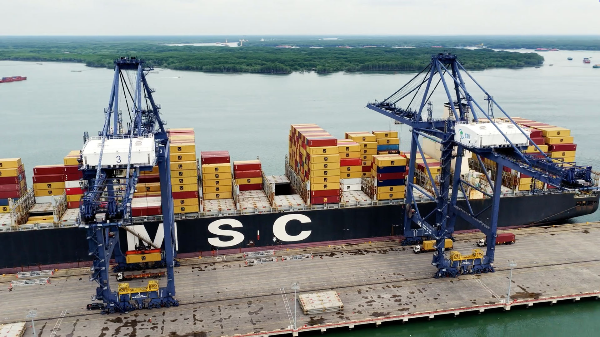 A large shipping barge docked at a port