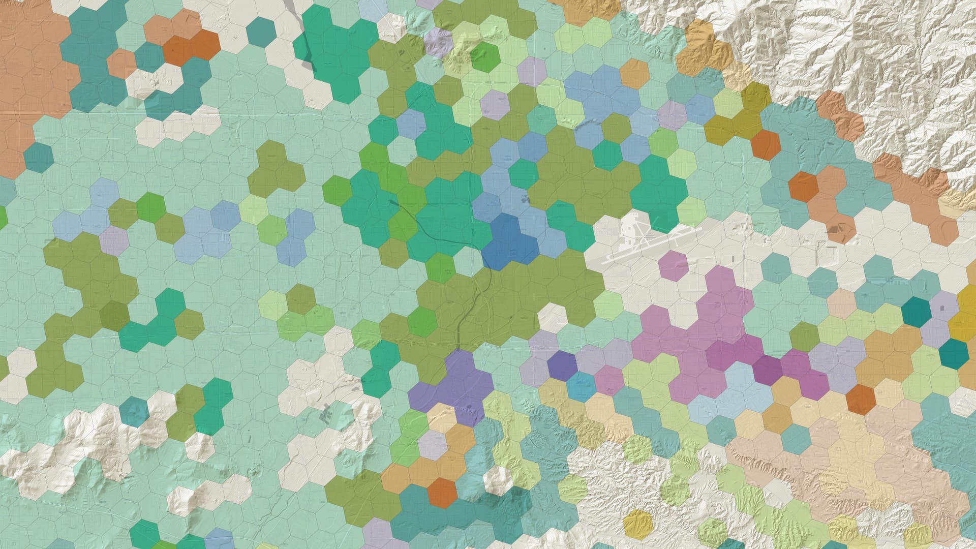 A multicolored hex map that represents the work of GIS professionals