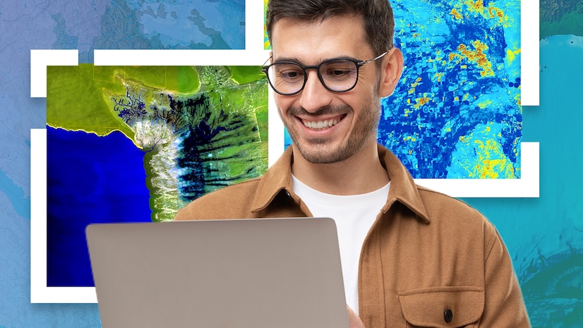 A smiling young man on a laptop against a digital map background